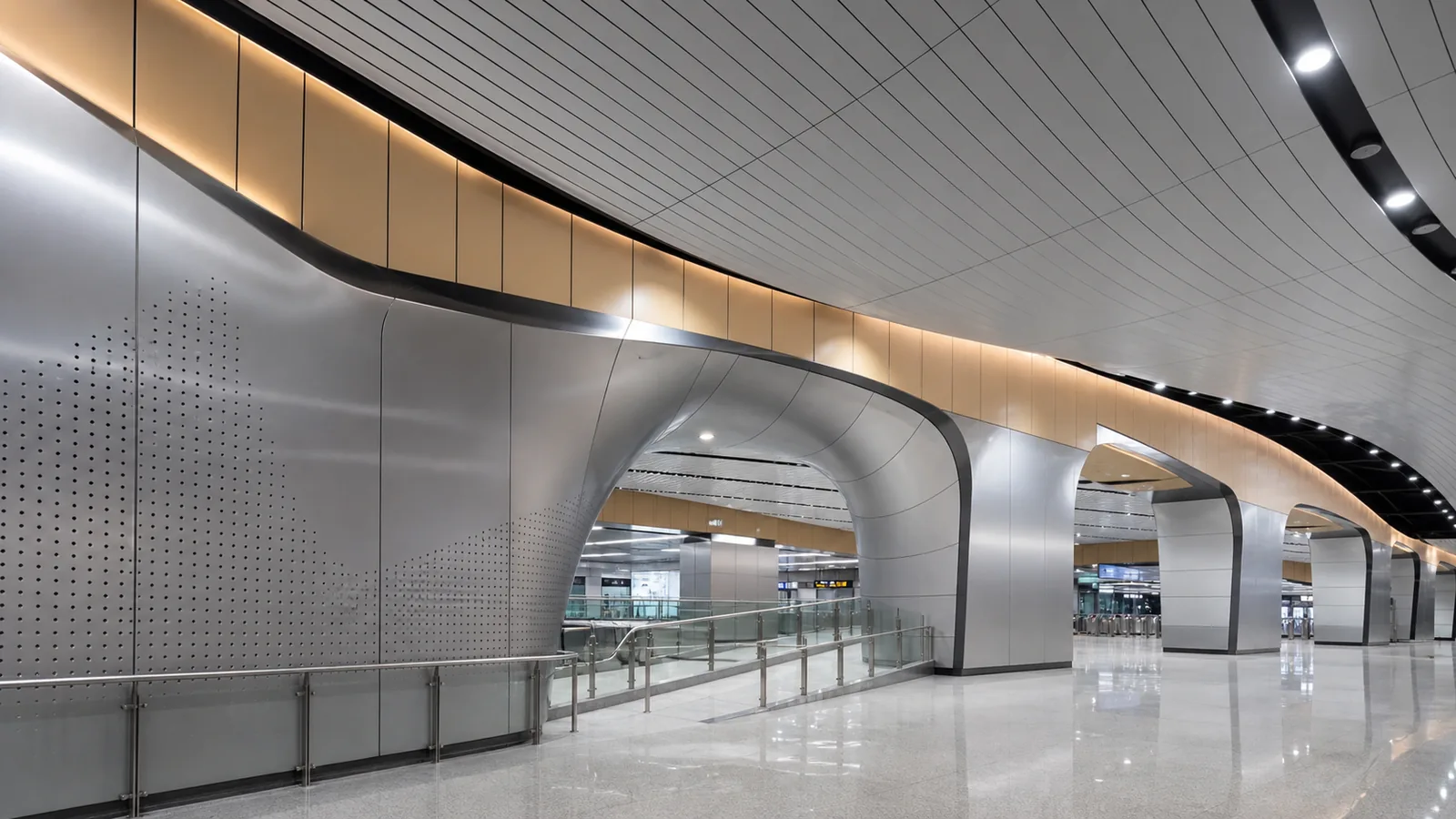 Subway station interior using aluminum panels for ceiling and wall cladding